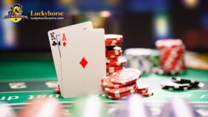 playing cards with casino chips on top of a blackjack table